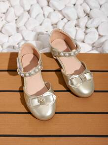 1 双时尚女孩珍珠蝴蝶结平底便鞋，春夏