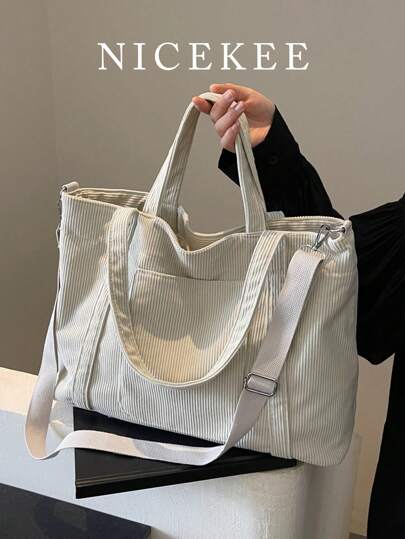 新款时尚经典学院风休闲多口袋大容量双提手单肩包，特别保暖。适合校园、办公室、日常搭配、约会、购物、郊游、送礼等各种场合。大学生必备单品。