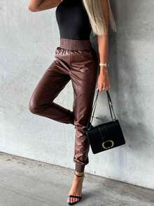 Eleganckie plisowane brązowe skórzane obcisłe spodnie damskie