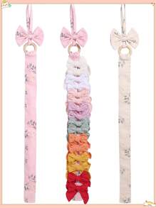 1 pièce Pince à cheveux en forme de nœud, support en tissu, convient pour les bébés filles. Accessoire de stockage doux en tissu pour les cheveux, rack mural pour cheveux, présentoir mural pour accessoires de cheveux pour enfants