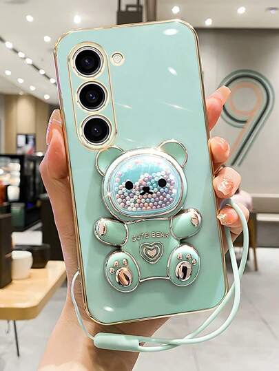 1pc Lanyard + Straight Edge Solid Color Fashionable Shock-Resistant Lightweight Anti-Slip Minimalist Liquid Quicksand Cartoon Candy Beads Bear Foldable Stand Phone Case Compatible With IPhone 6/7/8/X/XS/XR/11/12/13/14/15/16/17, Galaxy S22/S23/S24/S25, A04/05/06/A07/A14/A15/A16/A17/A24/A25/A34, Redmi Note 7/8/9/10/11/12/13/14, Redmi A5 A3 9/10/12/13C/14C, OPPO, MOTO, Honor, HW, Realme, Reno 7