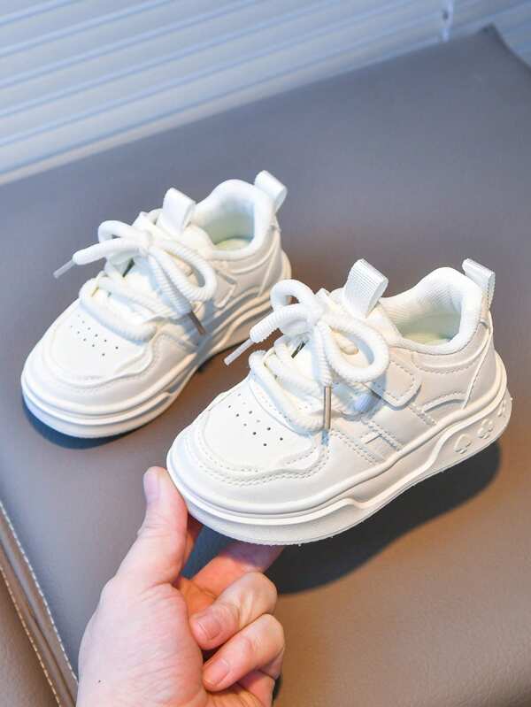 2025 Nuevos tenis blancos transpirables para niños, primavera/otoño, zapatos de lona casuales unisex para niños, ligeros y cómodos para actividades interiores/exteriores