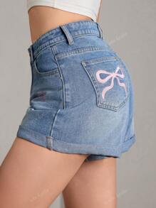 Short en jean d'été pour femmes, style bohème décontracté et mignon, avec ourlet roulé et broderie en forme de nœud papillon