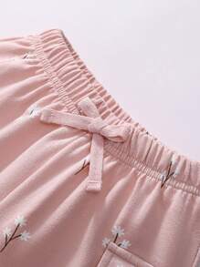 Set de 2 piezas de ropa de verano para niñas: Camiseta de manga corta rosa con estampado de conejo que dice "Cherish Friendship" y shorts tipo cargo a juego con estampado floral - Ropa suave para niñas jóvenes