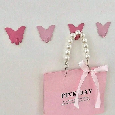 3 件粉色蝴蝶装饰墙钩。无需钻孔的挂钩。非常适合女孩房间装饰。极简主义风格。用于悬挂钥匙扣、外套、毛巾、帽子、珠宝、雨伞等。适用于客厅、卧室、办公室、家居装饰、房间装饰、墙面装饰