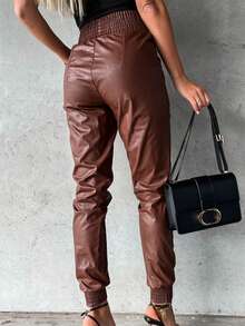 Eleganckie plisowane brązowe skórzane obcisłe spodnie damskie