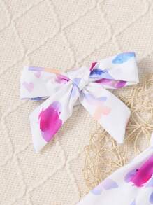 Set da 3 pezzi di abbigliamento estivo per bambine: canotta con fiocco e stampa a fiocco 3D, maniche a volant, e pantaloncini comodi a costine di colore unito - Viola - Visualizzare 4