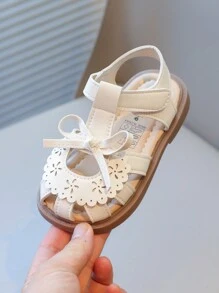 新款女童幼儿凉鞋可爱蝴蝶结镂空花卉图案软底防滑小孩鞋，适合夏季 - 米色 - 查看 5