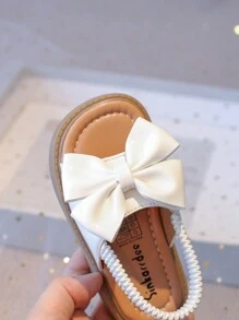 Nuevas sandalias planas para niñas con diseño minimalista de lazo, suela blanda antideslizante, para niños pequeños y bebés. Versátiles para uso casual diario en verano