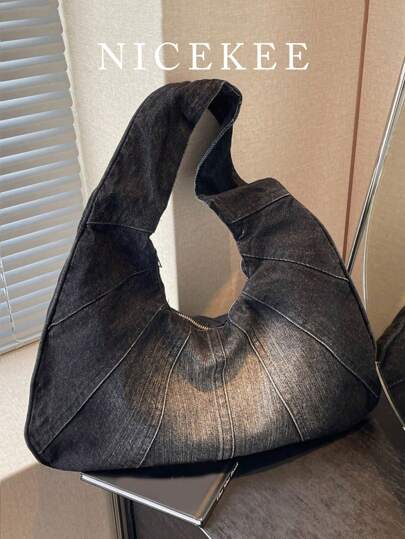 新款女士单肩包，新月形牛皮牛仔布手提包，大容量斜挎包，适合工作和休闲场合。简约设计，顺滑拉链，背负舒适，内部空间宽敞，完美契合春夏时尚，是牛仔女孩的理想之选。