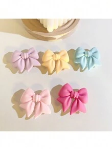 采用 ABS 材质的马卡龙蝴蝶结手机支架，防水，适用于智能手机的多功能支架，彩色哑光桌面支架