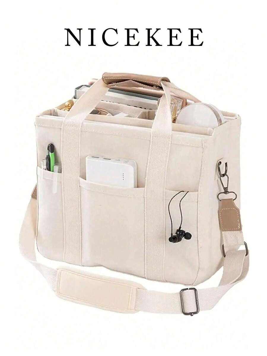 新款时尚大容量多隔层女士手提包，时尚百搭，设计独特，配有可调节可拆卸肩带，适合通勤、外出、购物和收纳。学生托特包采用多层设计，非常适合海滩、学校、工作和日常使用。