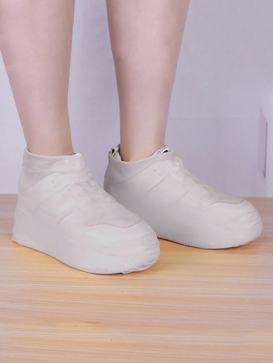 1 双可重复使用的硅胶防水鞋套，适合鞋子尺码 32-40 - 白色 - 查看 1