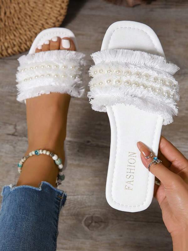 1 par de sandalias planas de mujer con borlas de estilo festivo y hermosas. Sandalias de playa para verano. Chanclas de gasa y perla, pantuflas de interior, Top tejida, suela media suave, para viajar y vacaciones, estilo casual, estética de hadas, pantuflas planas de verano.