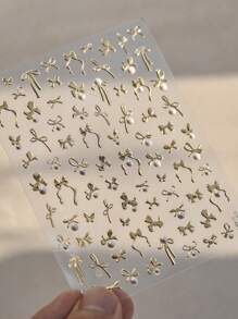 1张2025春节金色蝴蝶结美甲贴纸 5D混合奢华水晶仿珍珠胶带自粘美甲装饰贴纸 DIY美甲用品 - 金色 - 查看 2
