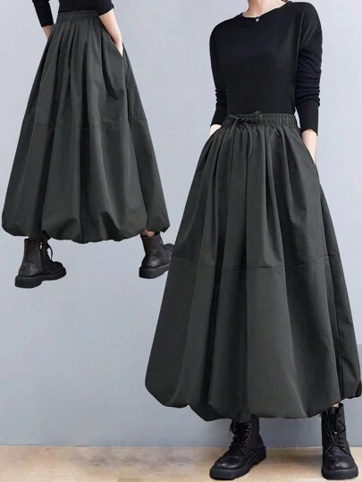 女士休闲 A 字形侧袋中长裙