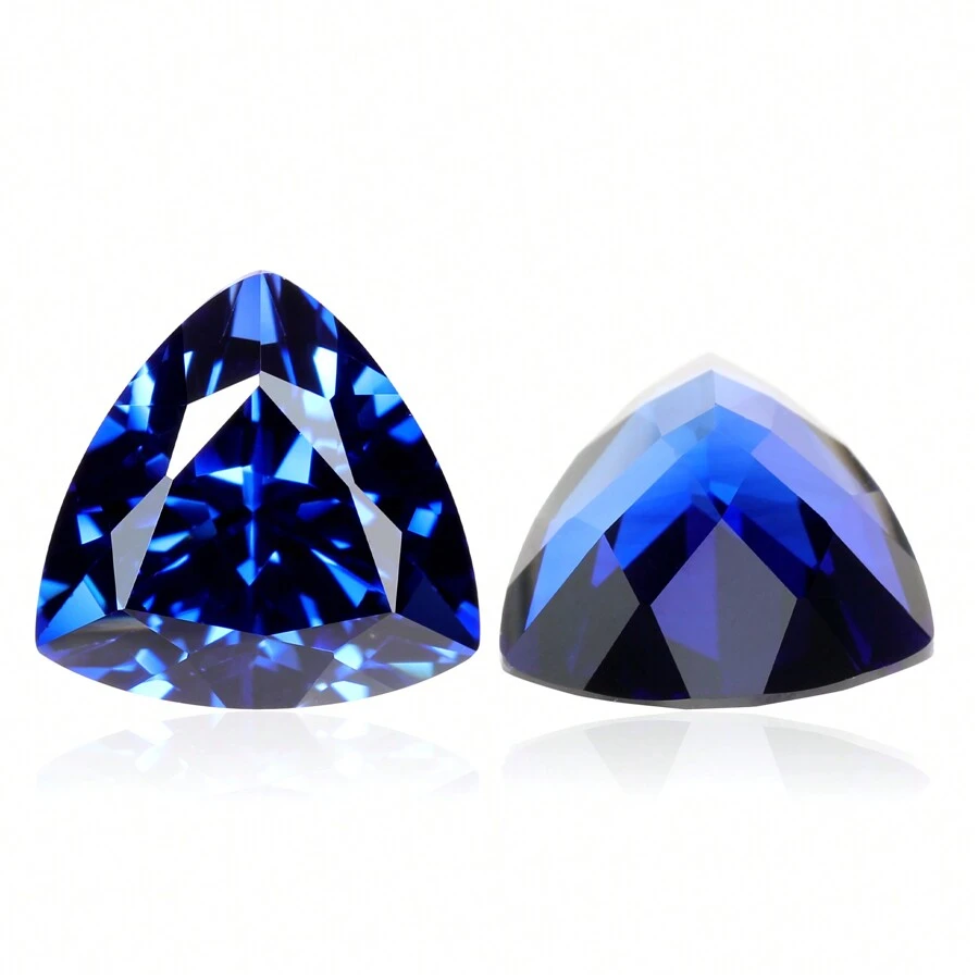 Una piedra preciosa de zafiro triangular 100% de laboratorio para hacer charms y materiales avanzados de joyería DIY