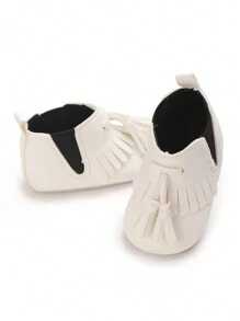 Botas de unicolor cálidas de alta caña con borlas, versátiles para niños pequeños, otoño/invierno