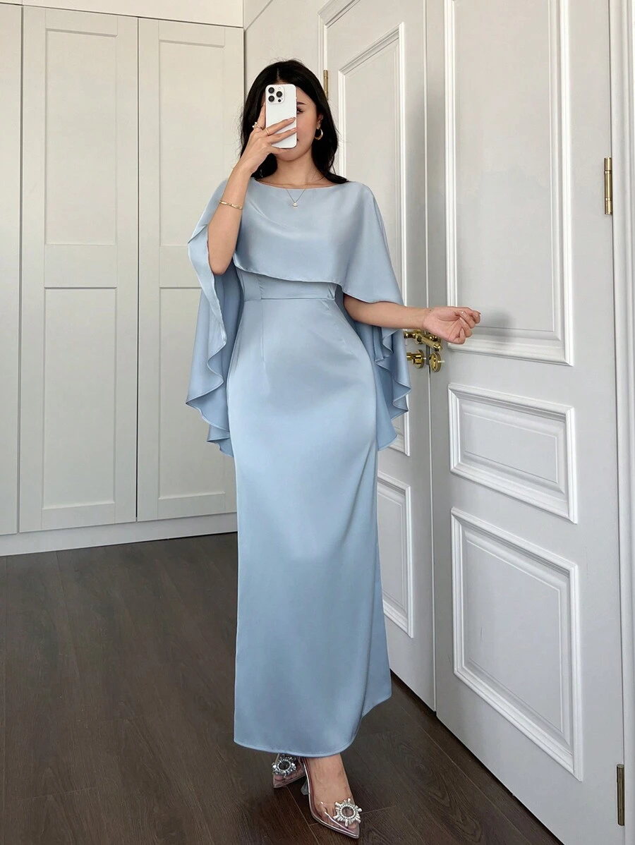 Elegant Dress For New Year's Eve, Paired With A Captivating Cape-Style Shawl And Discreet Zipper Details, Exuding A Refined And Sophisticated Aura.