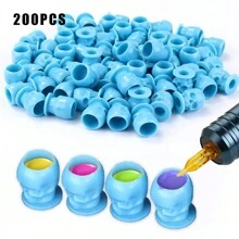 200 piezas/pieza Tazas de tinta para tatuajes con forma de calavera, tapas de contenedor de pigmento para maquillaje permanente desechables y creativas - Multicolor - Ver 12