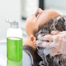 Set de 4 envases de viaje de gran capacidad de 100ml, botellas rellenables a prueba de fugas para cosméticos y productos de cuidado de la piel, con bolsa de almacenamiento - transparente - Ver 5