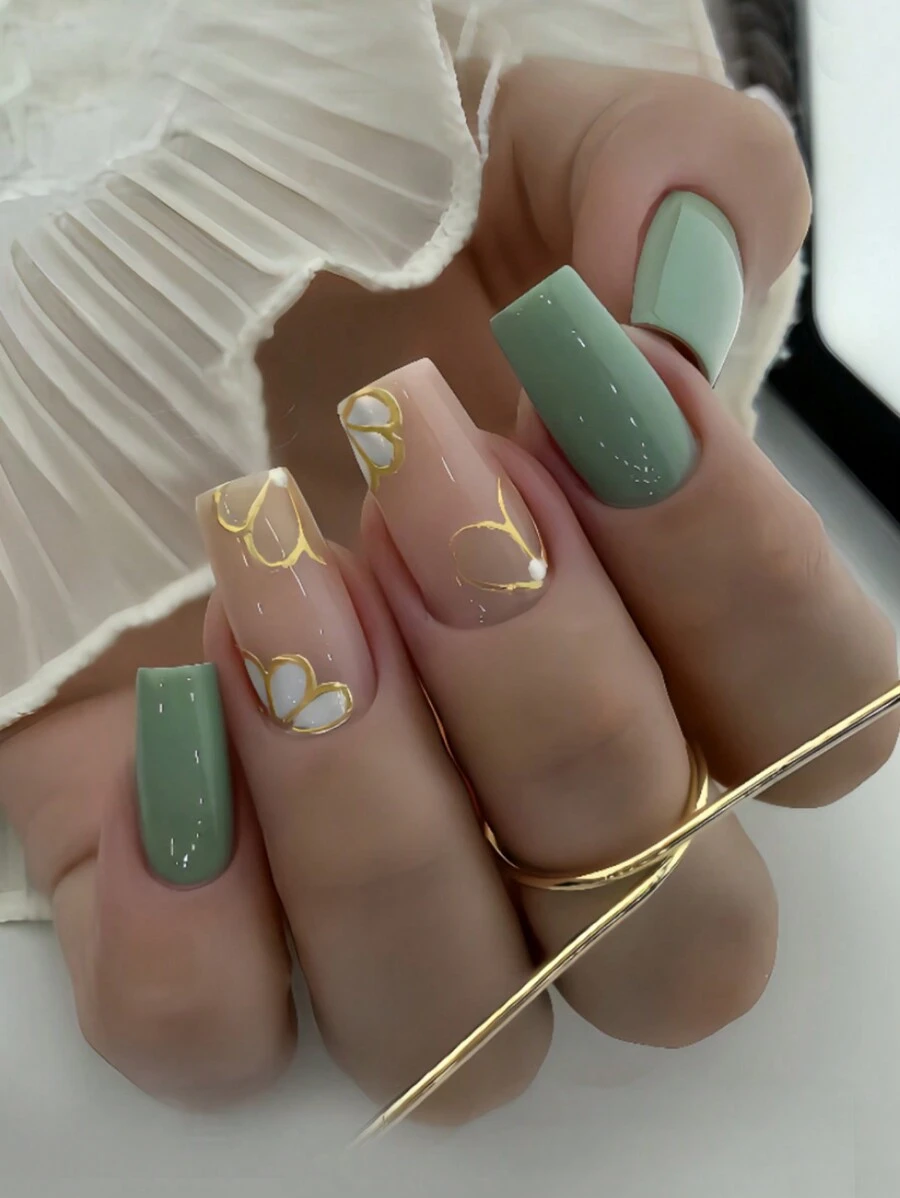 24 piezas Pegatinas de uñas cuadradas medianas de color verde con líneas doradas elegantes y decoración floral verde claro, diseño de cobertura completa adecuado para mujeres y niñas, incluye 1 hoja de pegatinas adhesivas y 1 uña postiza mini, adecuado para el Día de San Patricio y el uso en la oficina, se incluye pegamento para uñas al azar - Verde - Ver 1