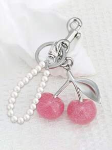 Nuevo llavero de metal con colgante con perlas falsas y cristal con forma de cereza, apto para uso diario. Dije con forma de cereza brillante con clip para bolso, accesorio de resina y metal brillante para bolsos y carteras de mujer. Llavero con forma de corazón, accesorio para bolsos, puede enviarse como regalo a familiares, amigos, compañeros de clase, parejas, cumpleaños, profesores, recuerdos.