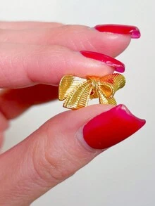 Gold Bow Earrings, Feminine, Delicate And Elegant Design, Ideal For Formal Occasions And Modern Styles