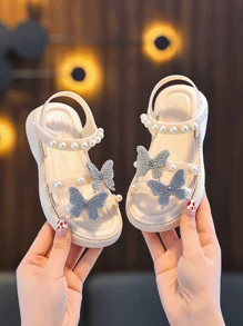 Sandalias para niños, estilo 2025, zapatillas de baño de suela blanda para niñas de verano, zapatos de playa antideslizantes con decoración de perlas - Blanco - Ver 1