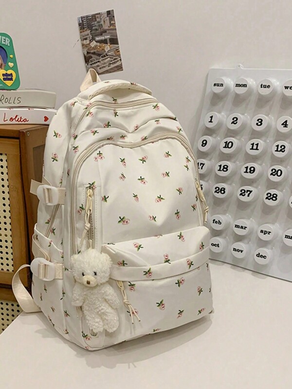 Sac à dos de fille imprimé de roses à la mode avec plusieurs compartiments et poches, sac à dos d'étudiant épais, sac à dos imperméable, avec pendentif ours en peluche comme accessoire, grande capacité, style artistique pour sac scolaire pour adolescentes, sac de livre pour femmes ou étudiantes, parfait pour les livres, les courses, la rentrée scolaire et plus, fournitures scolaires essentielles pour femmes, filles et étudiantes, parfaitement assorti avec les accessoires de sac à dos