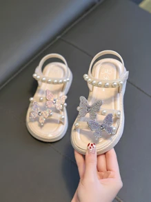 Sandalias para niños, estilo 2025, zapatillas de baño de suela blanda para niñas de verano, zapatos de playa antideslizantes con decoración de perlas - Blanco - Ver 2