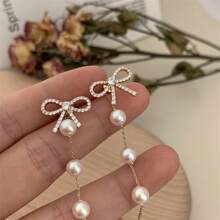 Par de pendientes de perlas con borlas en forma de lazo para mujer, pendientes de lujo con cierre, pendientes de clip para fiesta, boda, joyería nupcial, regalo