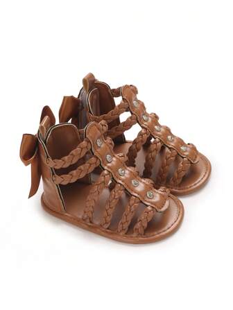 夏季新款韩版编织蝴蝶结装饰凉鞋，幼儿女童防滑透气步行鞋