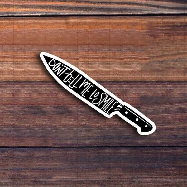 3-Inch "Don't Tell Me To Smile Knife Sticker - Bold And Relatable Vinyl Sticker For Laptops, Notebooks, Water Bottles, Office Desks, Study Areas, And Humor Zones | Great For Feminists, Sarcasm Enthusiasts, Humor Fans, And Students | Perfect Gag Gift For Friends, Family, And Colleagues | Bold Sticker For Relatable Humor, Work Fun, And Pride"