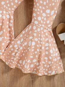 Conjunto de 2 piezas de niña compuesto por top de tirantes con aplicación de encaje floral en unicolor y pantalones acampanados estampados