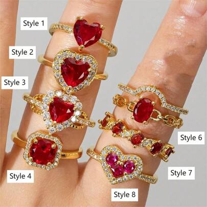 خاتم قلب رفيع الجودة مرصع بأحجار كريمة حمراء على شكل شمسية - مناسب للارتداء اليومي الأنيق، هدية مثالية لعيد الحب أو المناسبات الخاصة.