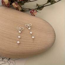 Par de pendientes de perlas con borlas en forma de lazo para mujer, pendientes de lujo con cierre, pendientes de clip para fiesta, boda, joyería nupcial, regalo