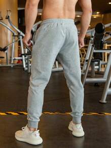 Pantalones deportivos casuales con cordón para hombres, para correr, hacer ejercicio, trotar, fitness, otoño - Gris Claro - Ver 2