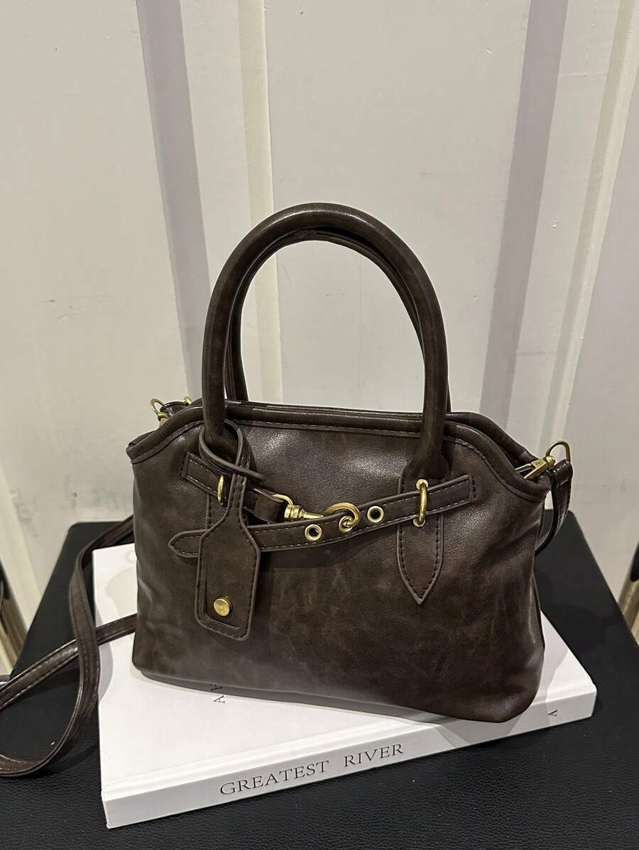 复古深咖啡色油皮女士手提包，贝壳形单肩斜挎包