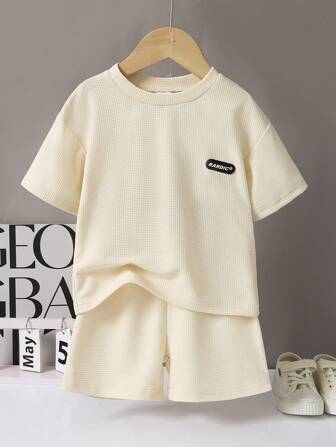 2pcs Young Boy Summer Outfit: Beige Waffle Top + Shorts Set