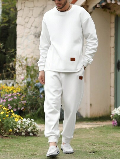 Conjunto de sudadera de manga larga con diseño de parches y pantalones largos con cordón en la cintura para hombre, de corte holgado