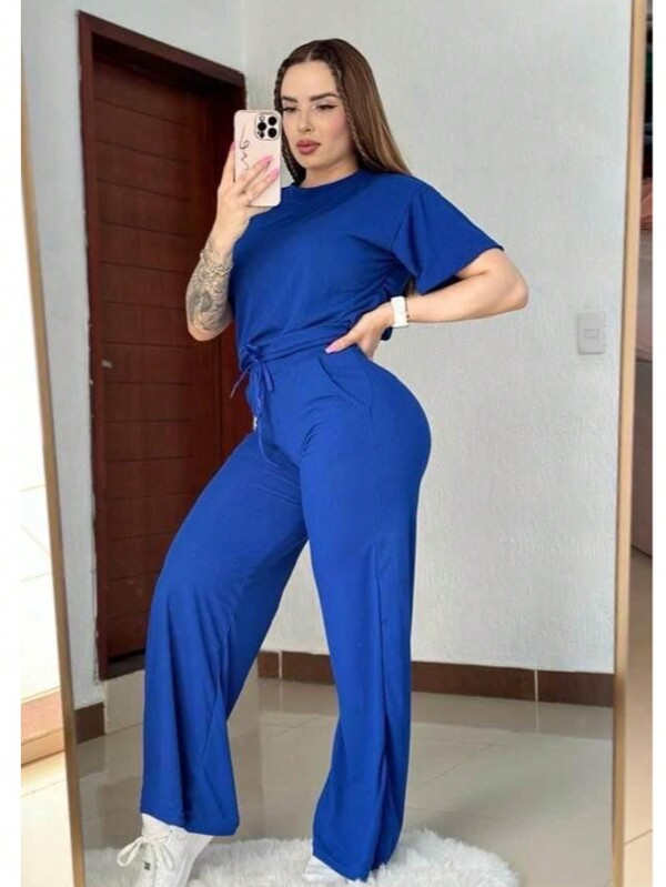 Set 2 piezas acanalado de blusa holgada con cordón en frente hombros caídos y pantalón acampanado con bolsas laterales y cordón en pretina de cintura tela fresca