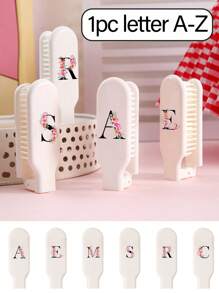 1pc Printed With Orange Pink Flowers And Black Letters Portable Travel Folding Comb, Initial Letters A-Z,Anti-Static Mini Pocket Hair Comb, Hair Styling Tools For Men And Women, Plastic Folding Comb,Travel Hair Brush, Portable Gift Lightweight Compact Small Hairbrush, Pocket Hair Comb For Travel