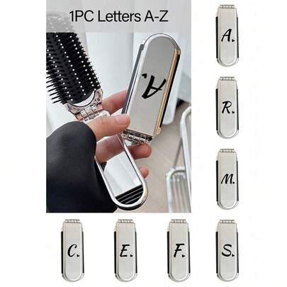 二合一镀银折叠梳子兼化妆镜 - 便携式，印有黑色 A-Z 字母和心形图案，适合旅行、度假和居家使用，方便携带，现代旅行美容工具