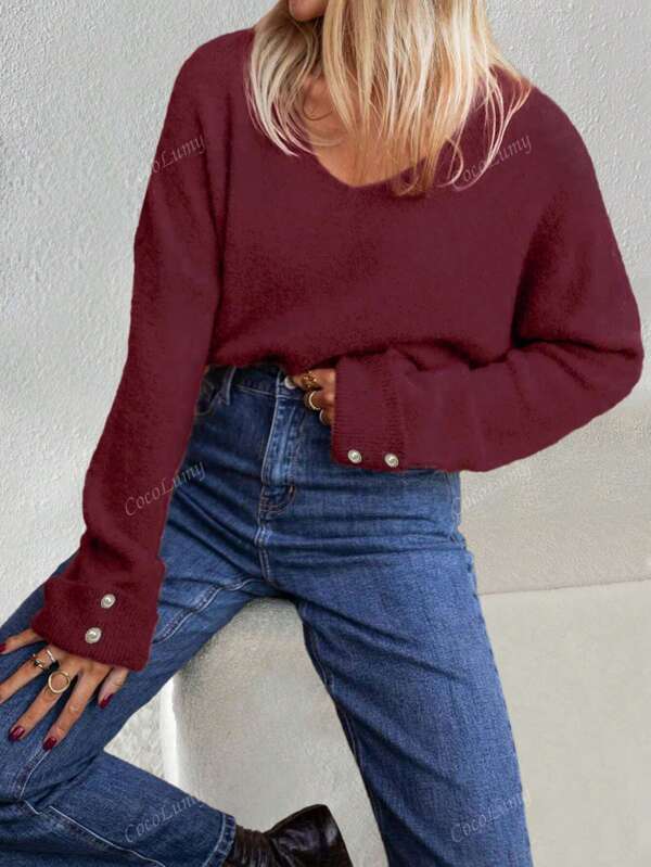 Maglione oversize elegante e casual da donna con scollo a V e bottoni in metallo con perle