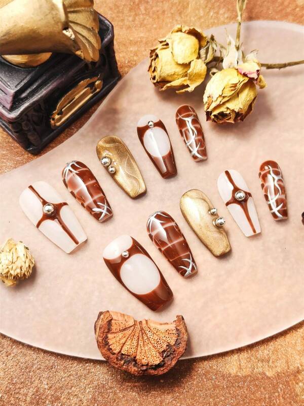 Hot Must-Have! 10pcs Medium-Long Trapezoid Shaped Premium Stylish Press-On Nails. Classic Brown-Gold Contrast Color Outlines Unique Personalized Patterns. Brilliant Metal Rhinestones Create Luxurious 3D Designs, Dazzling And Eye-Catching