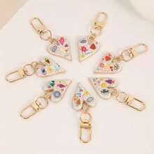 2 piezas de llaveros con colgantes de ojo del mal y flor con corazón de colores, accesorios de joyería DIY de moda, charms mixtos para mochila, bolso, coche, regalos de fiesta, regalos para amigos