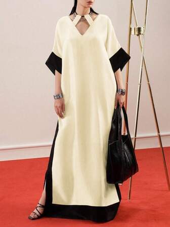 斋月新款休闲V领连衣裙，纹理垂坠撞色露背镂空设计，侧开衩，撞色拼接，中长袖，高端斋月长裙，适合正式场合和通勤穿着。