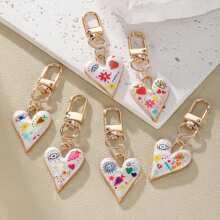 2 piezas de llaveros con colgantes de ojo del mal y flor con corazón de colores, accesorios de joyería DIY de moda, charms mixtos para mochila, bolso, coche, regalos de fiesta, regalos para amigos