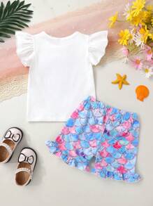 Set de 2 piezas con camiseta de niña pequeña suave y cómoda con volantes, estampado de concha de sirena y efecto ombré, y pantalones cortos deportivos con estampado de escamas en degradado